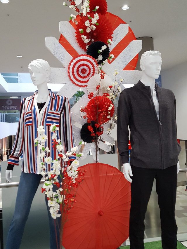 Freestanding red and white mannequins. Display by Silent Salesman, Melbourne.